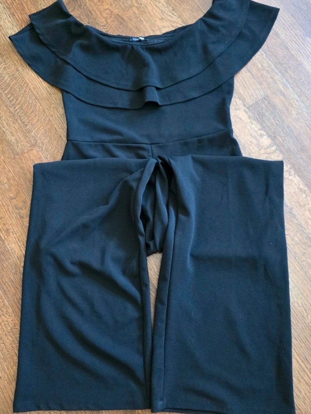 Fashion Nova Black Off-Shoulder Wide-Leg Jumpsuit with Ruffle Neckline